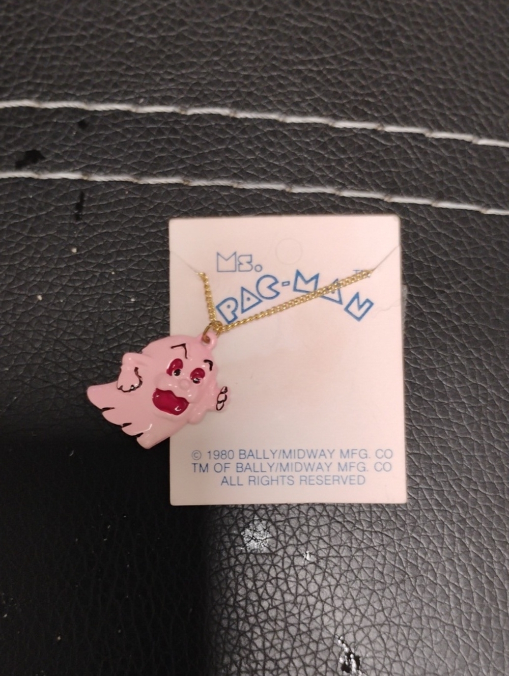 1980 BALLY/MIDWAY MFG CO MS. PAC-MAN PINKY GHOST NECKLACE MINT CONDITION